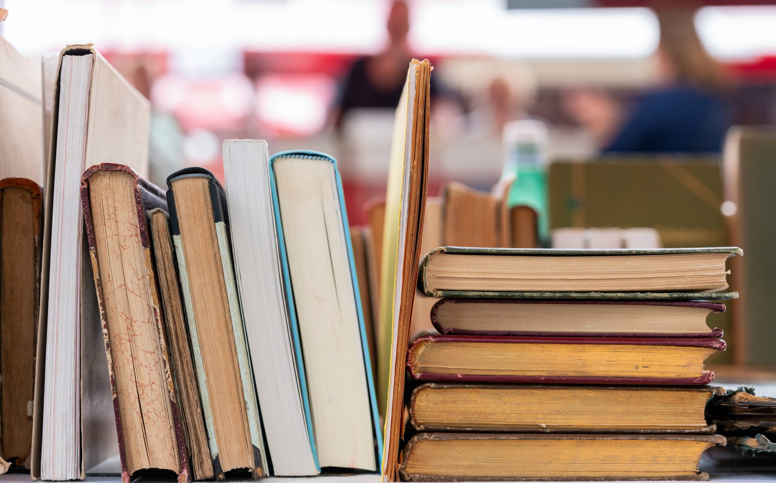 Assorted books with blurred background